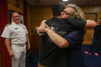 Navy Captain administers Oath of Enlistment for Son on Last Day of Service