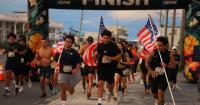 Tangi, Hawley lead Independence Day 2-mile race