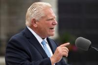 Environmentalist critics accuse Ford of using trade crisis to undermine green policies