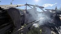 Shipwreck damaged in fire at historic Paddlewheel Graveyard near Dawson City, Yukon
