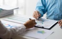 What Could QBE (ASX:QBE) Mean for Financial Stocks?