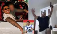 Former rugby league star's son and alleged Coconut Cartel gangster shares bizarre 'gun dance' video as he taunts authorities from overseas
