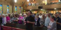 South Bend church holds prayer service calling for end to ICE detentions at Miami Correctional Facility
