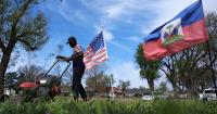 Trump administration deports Haitians, while giving South Africans more cash