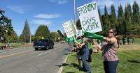 Washington state workers stage walkout over proposed agency cuts