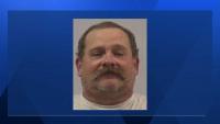 Iowa man in custody after alleged school board threat
