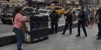 New York woman stabs two before being shot dead by police in Times Square