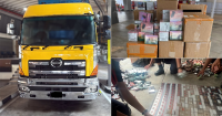 ICA officers unbox goods on Malaysia lorry declared as cardboard, uncovers over 10,400 vapes and pods