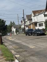 Weather delays repaving of street after waterline replacement