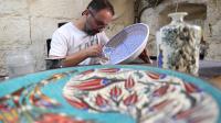 Turkish ceramic artist blends traditional art with global motifs