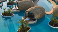 The Greek hotel that looks more like the Maldives with overwater villas and floating breakfasts