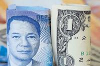 Peso falls to fresh record low of 62.40:$1