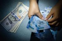 Peso plunges to new record low of P62.4:$1