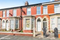 Investment opportunity 4-bed Blackpool home comprising 2 separate flats earning £1,200 per month for sale