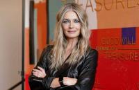 Paulina Porizkova Wears Nothing but a Black Bra and a Slinky Satin Skirt Beneath Her Cheetah Print Coat