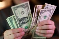 Dollar holds firm as Middle East hostilities lift oil 
