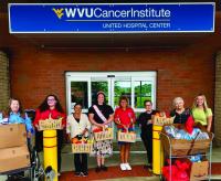 Local organizations donate produce boxes to outpatient cancer patients at United Hospital Center