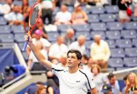 Keys, Fritz cruise as rain disrupts U.S. Open play