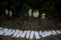 World Associated Press Some missing tourists make contact as Nepal flood death toll tops 1,100