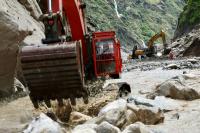 China restores access to Tibet disaster zone as highway reopens