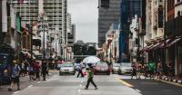 Economists see stronger Singapore growth as risks persist
