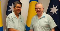 PM gets news of his worst approval rating yet, while he is away tackling crime in the Pacific