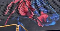 Artist finishes new downtown mural