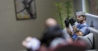 Processing trauma through photography and action figures | State of Art