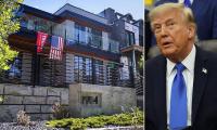 Canadian mansion covered in MAGA flags is vandalized as woke locals call for it to be torched