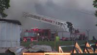 Crews battle large fire at waste management transfer station in Milwaukee