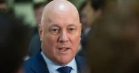 Luxon defends extra overseas plane after criticising Hipkins