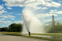 Pickup Crashes Onto Fire Hydrant Near McCully Hospital, Trapping Four