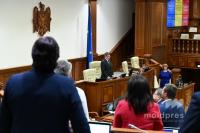 MPs stand silent for one minute in memory of victim of tragedy in central Moldova village, femicide victims