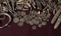 Homeowner finds Denmark's biggest ever haul of Viking silver while digging up his garden - including jewellery, coins, and even a tiny Thor's hammer