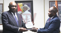 Health Minister Baryomunsi receives medal of national pride
