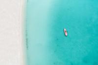 10 Beaches With the Clearest Water in the Caribbean, From Turks and Caicos to Aruba and the Cayman Islands