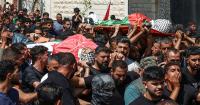 Israelis shoot dead two Palestinian teens after settlers encircle village in West Bank