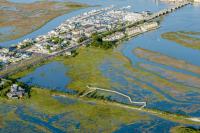 New Jersey scientists build muddy islands to keep coastal marshes from drowning