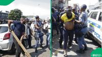 WATCH: Congolese man arrested after cop is hit during March and March clash in Durban