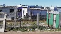 South Africa rooftop solar kits light 2,000 shacks, create resident repair jobs