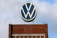 Volkswagen approves plan to cut 50,000 jobs