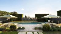 Retail boss lists $17m ‘interim’ home as he moves into Swans chairman’s $40m abode