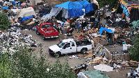 'A humanitarian crisis': Neighbors plead for city to deal with south Seattle encampment