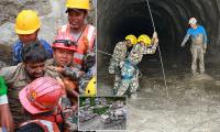 Two men rescued from Nepal tunnel nine days after flood as more voices heard inside hydropower plant