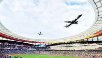 Airline defends airplane thunder over packed stadium