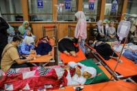 Indonesia’s top rights body calls for police to probe poisoning of more than 2,000 students
