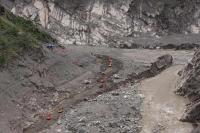 China exerts tight grip on information after floods