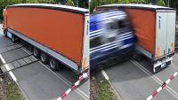 Truck gets stuck between barriers at railway crossing in Poland, moments later disaster strikes