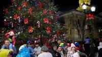 Who is the parade marshal for this year's holiday parade in Athens?