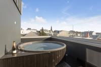 8 Central Airbnbs in Reykjavik with Hot Tubs—Great for Couples
